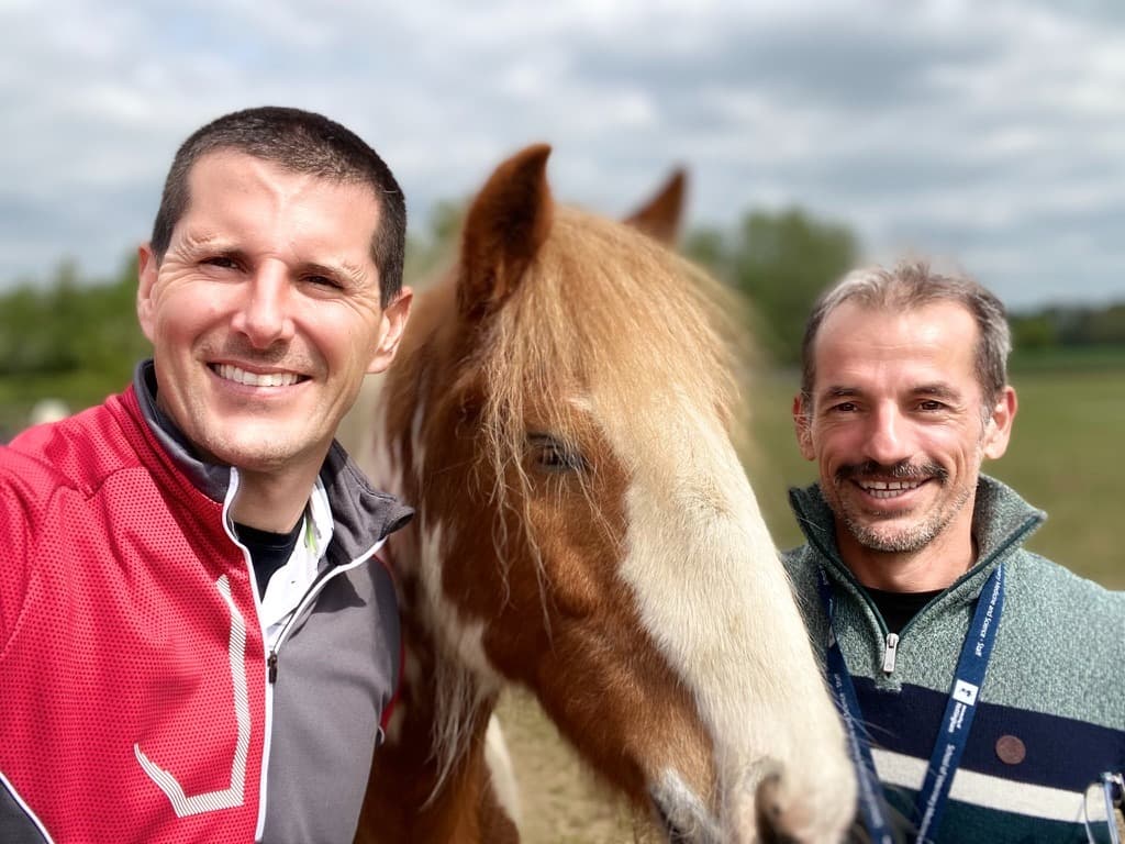 Marco Duz and Ignacio Corradini in the field with Mango at the University of Nottingham